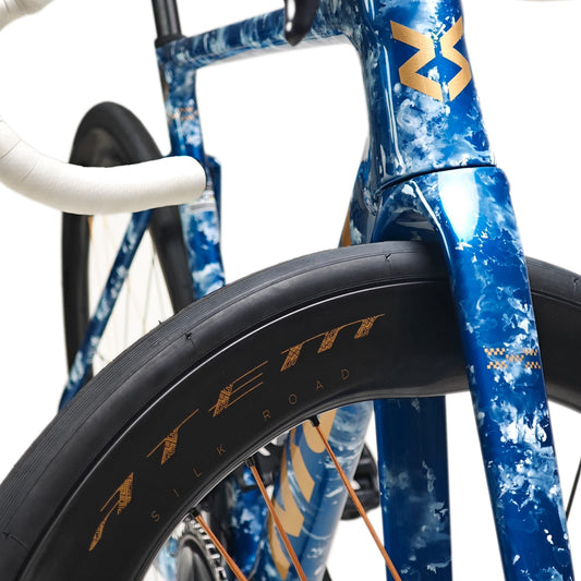 Approved Cycling Nich Legend carbon fiber road bike frame detail, showcasing lightweight construction.