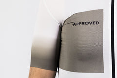 APPROVED CYLCLING Men's Core LTD summer jersey, side profile on rider, ergonomic design, performance cycling apparel.